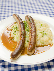 Image showing  thuringian sausage thuringer rostbratwurst with potato cucumber