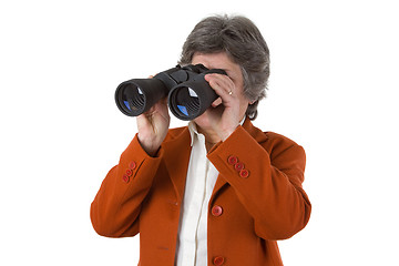 Image showing Female senior business woman with binoculars