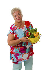 Image showing Female senior with fresh vegetables