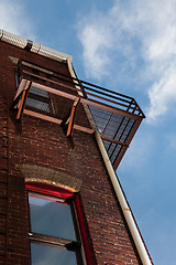 Image showing Fire escape on brick building from below