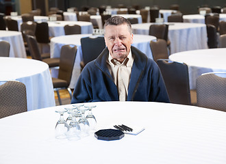 Image showing Man crying in empty conference room