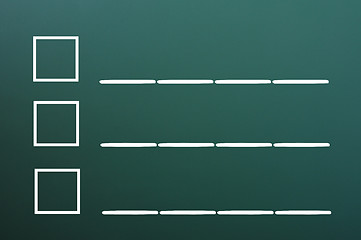 Image showing Blank list on a blackboard background