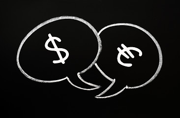Image showing Two speech bubbles for Dollar and Euro dialogue on a blackboard