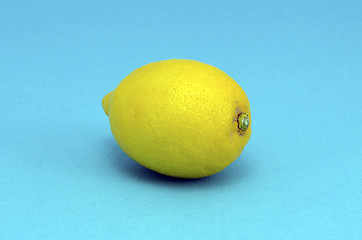 Image showing Lemon heatlhy fruit closeup on blue background 