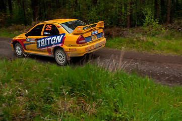 Image showing P. Barrett driving Mitsubishi Evo