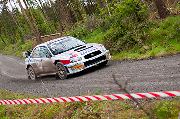 Image showing K. Barrett driving Subaru Impreza