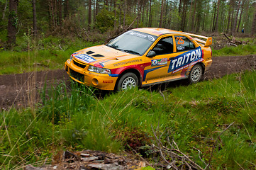 Image showing P. Barrett driving Mitsubishi Evo