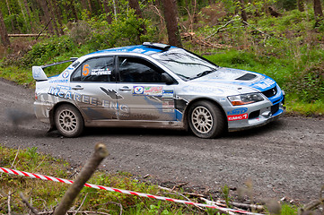 Image showing V. Mcaree driving Mitsubishi Evo