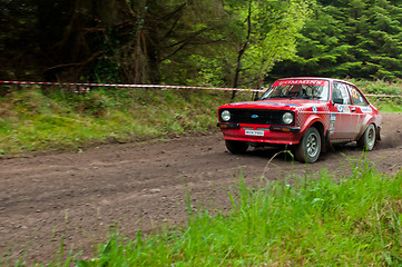 Image showing A. Commins driving Ford Escort