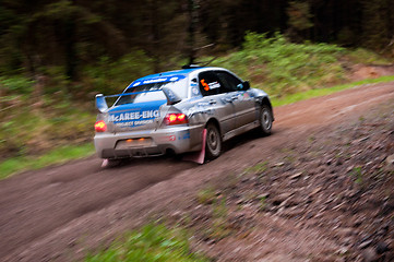 Image showing V. Mcaree driving Mitsubishi Evo