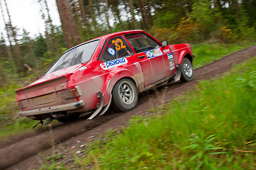 Image showing A. Commins driving Ford Escort