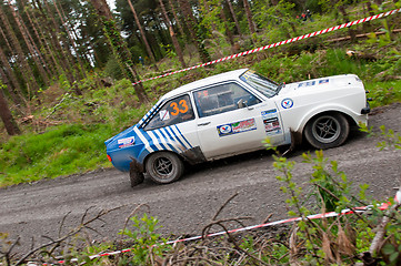 Image showing S. Benskin driving Ford Escort