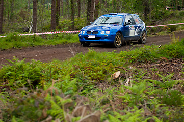 Image showing M. Brady driving Rover MG