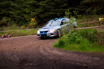 Image showing V. Mcaree driving Mitsubishi Evo