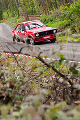 Image showing A. Commins driving Ford Escort