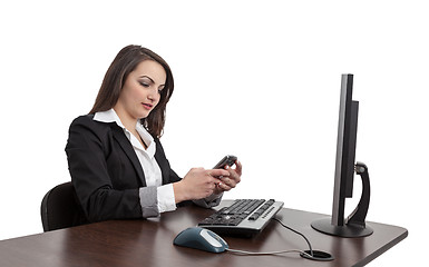 Image showing Businesswoman Checking Her Mobile