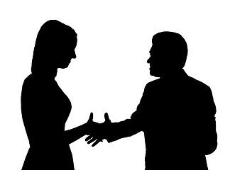 Image showing Silhouette of the man shaking hand to young woman