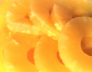 Image showing yellow canned pineapple rings, vegetarian food  