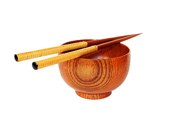 Image showing Chopsticks with wooden bowl isolated on white 