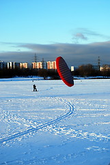 Image showing snowkiting on a frozen lake 
