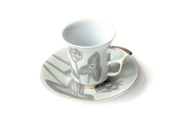 Image showing empty cup and saucer  with pattern  