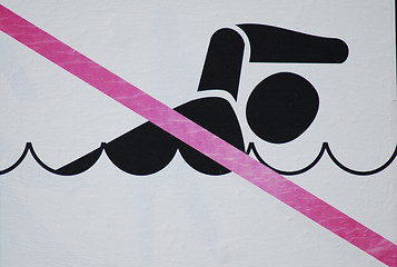 Image showing no swimming sign  in the near of  the pond 