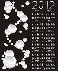 Image showing vector calendar 2012 with white pearls on black background 