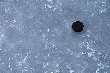 Image showing ice rink surface with a puck