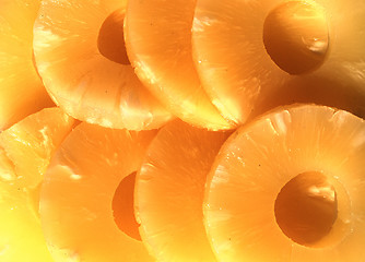 Image showing yellow canned pineapple rings, vegetarian food  