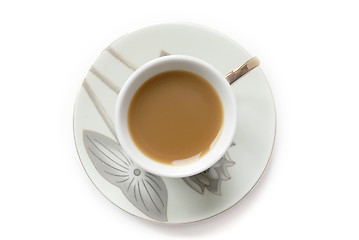Image showing cup of coffee with milk or cream and saucer 