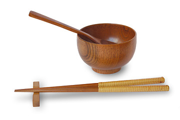 Image showing Chopsticks with wooden bowl isolated on white 