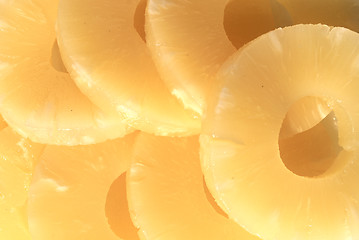 Image showing yellow canned pineapple rings, vegetarian food  