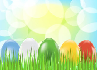 Image showing Colored easter eggs on green background with grass    