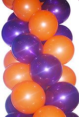 Image showing orange and violet balloons 