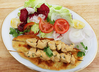 Image showing Chicken tikka kebab meal