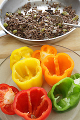 Image showing Making stuffed bell peppers