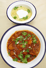 Image showing Chicken tagine and couscous vertical