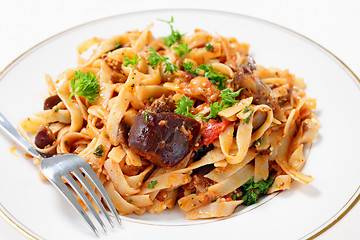 Image showing Eggplant in tomato sauce with pasta