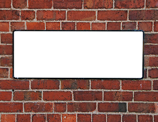 Image showing Sign on a brick wall