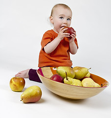 Image showing baby with apples and pears