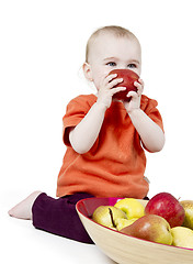 Image showing baby with apples