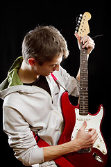 Image showing Man With The Guitar