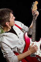 Image showing Man With The Guitar