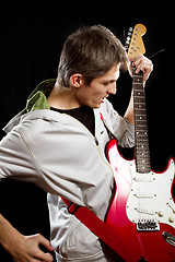 Image showing Man With The Guitar