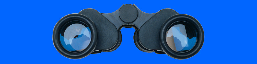 Image showing Black binoculars on blue background.