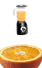 Image showing orange fruit and blender