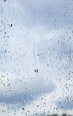 Image showing natural water drops on window glass