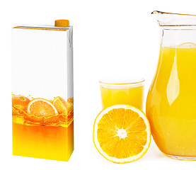 Image showing Fresh orange juice in a glass and carton box