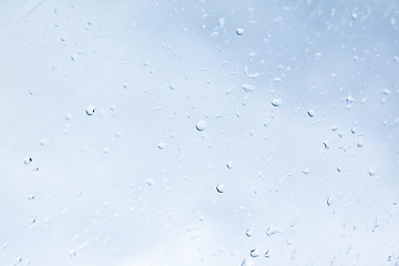 Image showing Rain water drops on windows glass