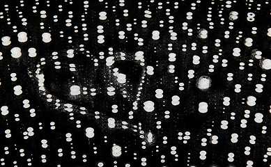 Image showing milk drops on black